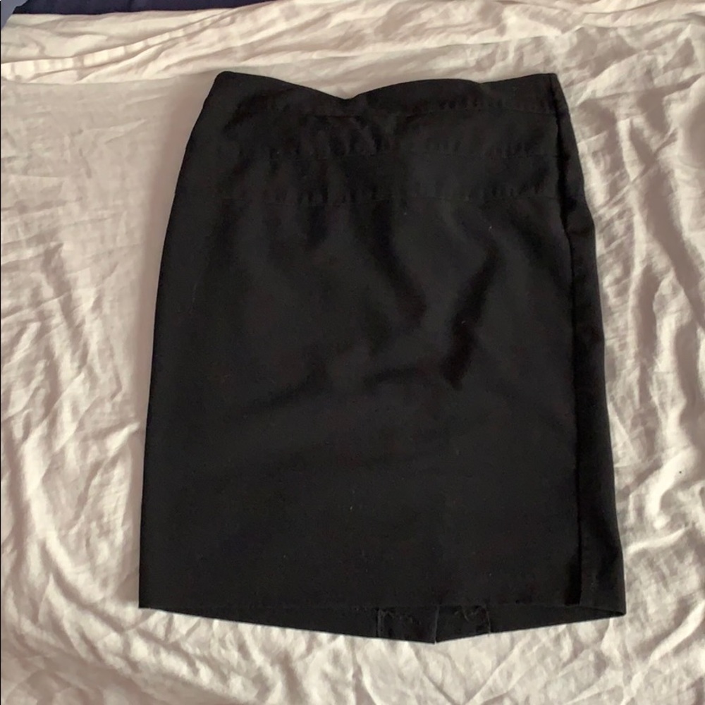 3 for 10 A black pencil skirt with back slit